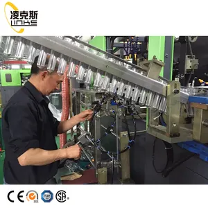 Full automatic PET blowing molding bottle stretch blow moulding machine production line