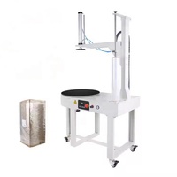 Machine d'emballage électrique à film étirable compacte avec moteur pour cartons, palettes et bagages - Applications alimentaires et de boissons
