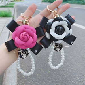 Elegant Pearl Camellia <b>Keychain</b> Bowknot Handmade Ladies Bag Pendant Bow <b>Leather</b> Flower <b>Keychain</b> - Product Image 2