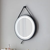 Miroir de salle de bain moderne de luxe personnalisable avec éclairage LED noir, cadre en aluminium, capteur tactile intelligent, montage mural, design graphique