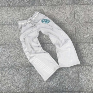 กางเกงวอร์มผ้าคอตตอนสำหรับผู้ชายกางเกงทรงหลวมลายทางด้านข้างเอวสูงปักโลโก้ได้ตามต้องการ - Product Image 2