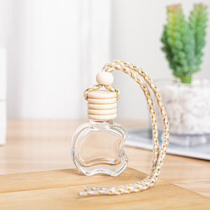 MUB Bon marché en forme de <span class=keywords><strong>pomme</strong></span> 10ml <span class=keywords><strong>vide</strong></span> en verre suspendu Petit désodorisant pour diffuseur de parfum de voiture - Product Image 1