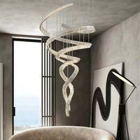 Lustre en cristal de spirale de luxe pour l'escalier haut de plafond de maison d'hôtel