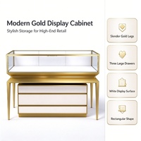 Vitrine de présentation de bijoux moderne sur mesure, vitrine à bijoux en verre avec cadre doré et tiroirs de rangement pour boutique de montres