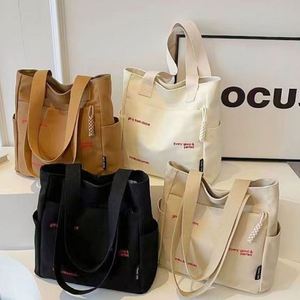 Bolsas de Compras Reutilizables de Lona de Algodón con Logotipo Personalizado, Estilo Nuevo, con Bolsillo y Cremallera para Mujeres Estudiantes - Product Image 1