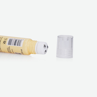 Tube souple en PE jaune clair avec applicateur à bille en acier inoxydable et capuchon extérieur transparent pour crème contour des yeux anti-rides
