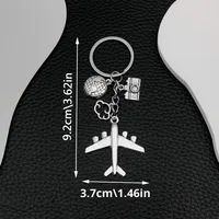 Porte-clés publicitaire en alliage de zinc, globe terrestre moderne en forme d'avion, cadeau publicitaire