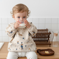 NOUVEAU Bavoir Bébé Imperméable Coloré à Bon Prix en PU Lavable, Tablier d'Alimentation pour Bébé, Blouse de Protection Intégrale à Manches Longues avec Poche