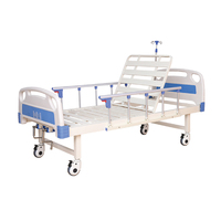 Lit d'hôpital manuel de haute qualité à 2 fonctions avec barrières pliantes en plastique ABS et poteau de perfusion en métal pour patient