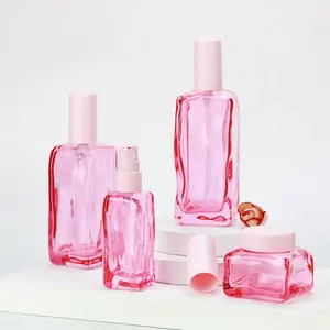 Pembe cam şişe cilt bakımı ambalaj losyon Serum krem kapları benzersiz kare boş kozmetik kavanoz ve şişe setleri 50G 40ML 100