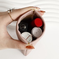Vente en gros sac d'obus fermé automatique en cuir PU mini poche pochette cosmétique de rouge à lèvres sac de bijoux de maquillage d'éclats d'obus