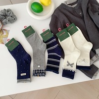 Nouvelle collection automne-hiver de chaussettes Dui Dui pour femmes, rayées en forme de nœud, mi-mollet, en coton peigné