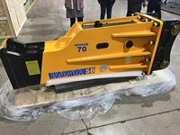 Marteau hydraulique SB70 pour excavatrices (16-21 tonnes) avec burin de 155 mm, accumulateur automatique, garantie 1 an, jaune, 1507 kg, emballage en bois