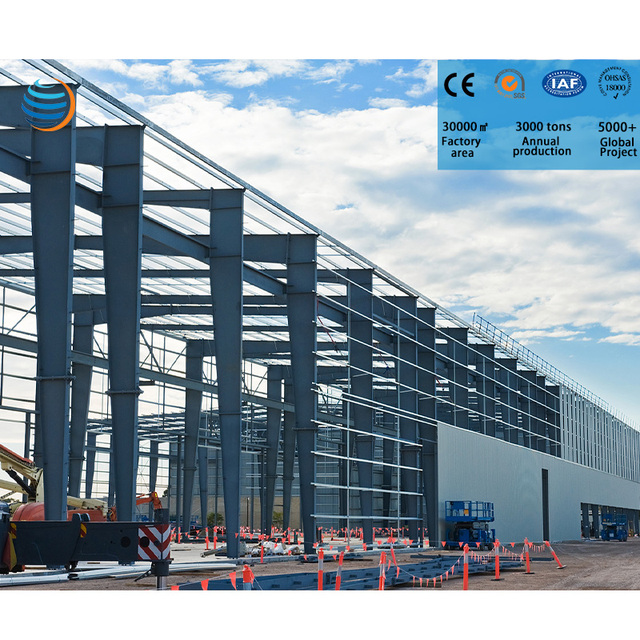 Large-span Steel Structure Workshop — Industrial factory building under construction with steel frame assembly