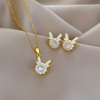 2024 Ensemble de bijoux en acier inoxydable avec collier tête de dragon rotative, boucles d'oreilles clous tête de dragon rotative en zircon cubique et bague