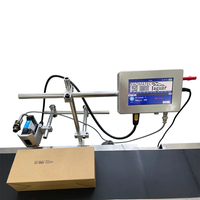 Machine de codage automatique en ligne YAOMATEC 12,7 mm pour l'impression de dates et de données variables sur les boîtes en plastique.
