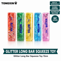 Lot en gros de jouets Squishy pour boutique de cadeaux, comprenant des jouets à presser doux de Noël en forme de barre longue avec paillettes, des mini Squishies et des Squishies à paillettes