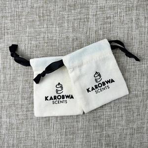 Sac à cordon en toile de coton biologique réutilisable avec logo imprimé, pochette de rangement durable pour vêtements et montres - Product Image 5