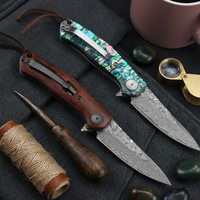 Couteau pliant tactique de survie en acier Damas avec manche en coquille, idéal pour le camping et les activités de plein air, vente en gros OEM