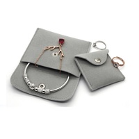 8.5*10cm coloris Gris flannellette fourrures sur l'extérieur et l'intérieur bouton pression bijoux emballage sac pochette à bijoux