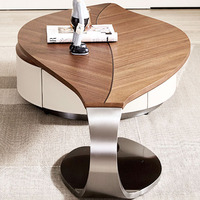 Table basse en bois au design unique, forme de feuille spéciale, moderne et créative, avec placage en noyer et structure en métal