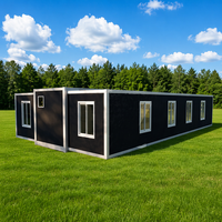 Cabane de vacances extensible préfabriquée noire, résistante aux intempéries et à l'eau, réutilisable, avec design multi-fenêtres, pour prairies et forêts