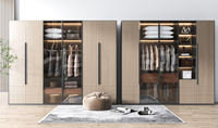 Placard moderne personnalisé avec portes coulissantes et plates en verre Vestiaire de chambre à coucher de luxe léger pour appartement ou hôtel