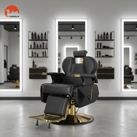 Fauteuil de barbier moderne en similicuir confortable avec structure métallique, noir et or, pivotant, pour salon de coiffure