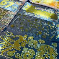 Autocollants holographiques dorés scintillants UV pour emballages de gobelets en PET, emballages cosmétiques, boîtes cadeaux, impression par transfert à surface brillante et chatoyante