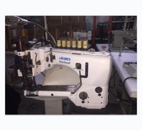 Machine à coudre Juki MS-35800 à cylindre, 3 aiguilles, point de chaînette double, utilisée pour la couture de tissus de travail extra-lourds.