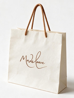 Luxuriöse Glänzende Kunstpapier-Geschenktüte mit Langen Henkeln Umweltfreundliche Einkaufstasche für Hochwertige Marken-Geschenkverpackungen mit Individuellem Logo
