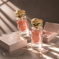 Flacon de parfum premium en verre, 50 ml, cylindrique, corps incurvé, transparent, avec pulvérisateur, personnalisation possible