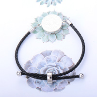 Mode peut ouvrir le bracelet de diffuseur d'huile essentielle en cuir de diamant Pu taille réglable fleur coeur motif bracelet de diffuseur