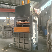 Presse à balles verticale industrielle Presse à balles hydraulique pour carton de ferraille Presse à balles en plastique textile de papier de rebut Presse à balles pour bouteilles PET d'occasion