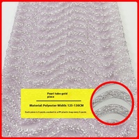 Tissu en dentelle brodée de perles et de sequins pour robes de mariée et vêtements, tissu tendance