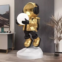 Vente en gros Spaceman Sculpture pour la décoration du salon Résine Space Craft Astronaute Smart Voice et Bluetooth Audio Statue