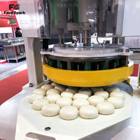 Machine automatique de division et de façonnage de pâte pour boulangerie, avec dispositif de sécurité d'arrêt d'urgence
