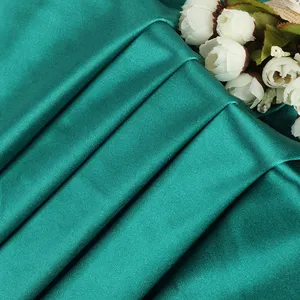 Nouveau design personnalisé de tissu vestimentaire hautement extensible et résistant à l'usure tissu spandex en polyester tricoté brillant pour jupe de danse latine