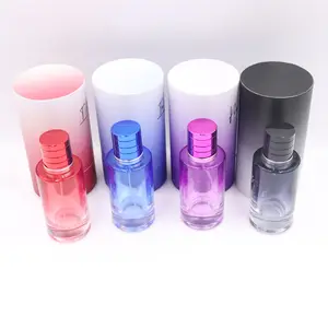 Özel parfüm şişesi lüks 50ml 100ml yuvarlak silindir şeffaf parfüm yeniden doldurulabilir şişe 30ml 50ml cam parfüm şişesi