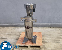 Machine de séparation de latex en caoutchouc de type tubulaire