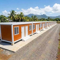 Maison préfabriquée détachable en conteneur, imperméable et isolée thermiquement, adaptée aux conditions météorologiques humides et pluvieuses de l'île de Chiloé