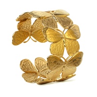 Bracelet jonc torsadé en forme de feuille, style punk, pour femme, en acier inoxydable plaqué or 18 carats, tendance et luxueux, idéal pour les soirées, par JUSTOP Designer Jewelry.