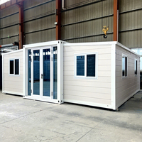 Villa Modulaire Préfabriquée 2 Chambres avec Salle de Bain Privative, Structure en Acier, Toit Incliné, Terrasse Imperméable, Jardin Extensible, Maison Conteneur