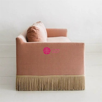 Canapé en velours Yicheng au design moderne et élégant avec jupe à franges et pompons en plumes, idéal pour salon et hôtel - Vente de mobilier