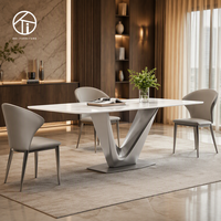 Ensemble de table à manger rectangulaire de luxe moderne avec 4 chaises, capacité de 6 personnes, pour la maison, l'hôtel ou la villa, plateau en pierre frittée, design contemporain