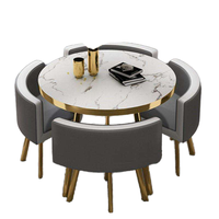 Ensemble de tables à manger en métal doré de luxe avec 4 chaises élégantes assorties, meubles de salle à manger haut de gamme pour la maison et les restaurants