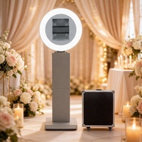 Vente d'usine Touch Vision : Photobooth pour iPad avec coque métallique haut de gamme, installation facile, anneau lumineux RGB et télécommande, idéal pour les mariages et les selfies