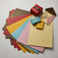 Papier texturé gaufré de luxe 120-350 g/m² en gros pour emballage de boîtes rigides et emballage cadeau haut de gamme