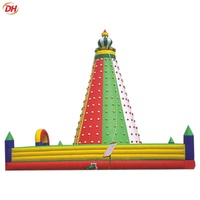 Tour de jeu gonflable géante économique pour enfants, structure d'aventure gonflable pour aire de jeux extérieure