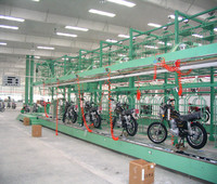 Ligne de production semi-automatique économique pour l'assemblage de motos, capacité de 10 à 100 unités par jour, personnalisable pour les usines